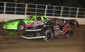 Josh Coonradt and Jason Casey battle for position