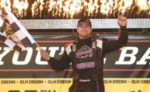 Brandon Overton stands on the Eldora Stage