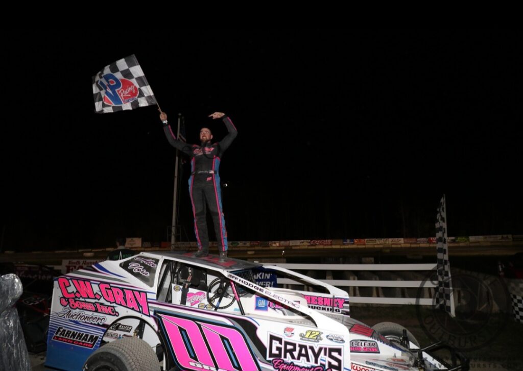 Jason Gray in Victory Lane in Bear Ridge